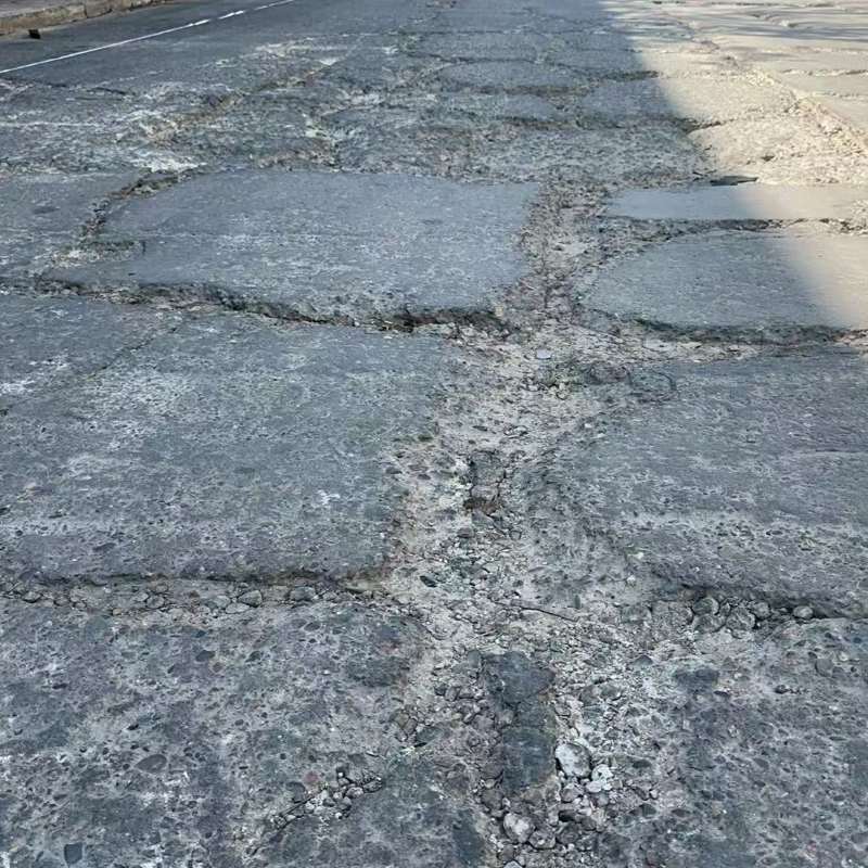 连城路面起砂露石子修补料